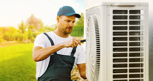 Technician performing routine maintenance