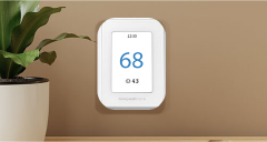 Honeywell thermostat on wall