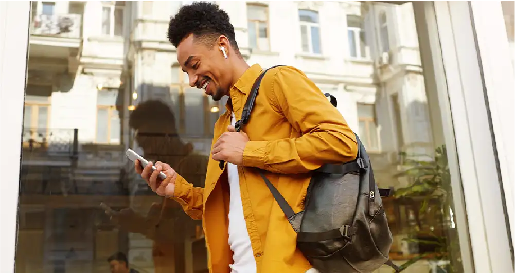 Woman on couch with pet and laptop