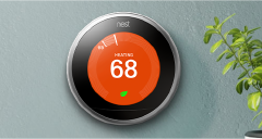 Nest thermostat on wall