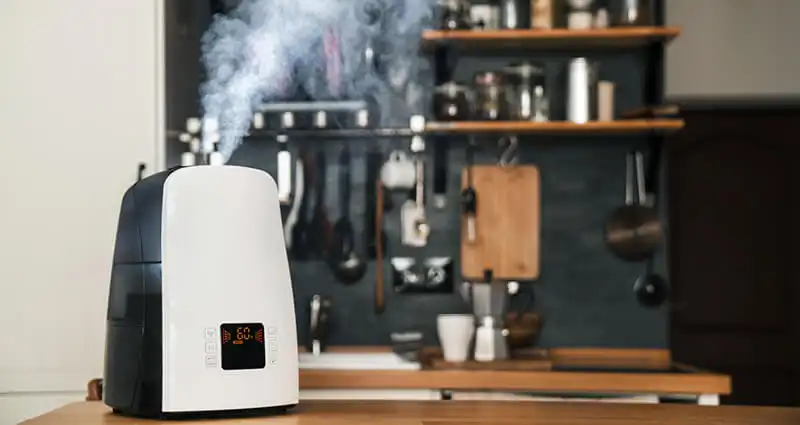 The humidifier distributes steam in the kitchen in loft style