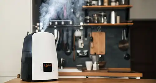 The humidifier distributes steam in the kitchen in loft style
