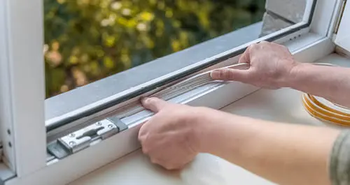 Adding weather stripping to window