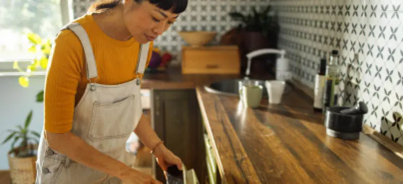 Loading the dishwasher before work