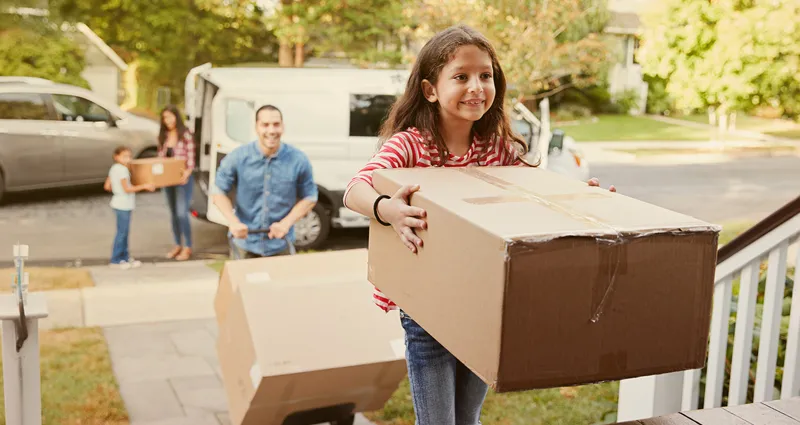 Family moving with boxes