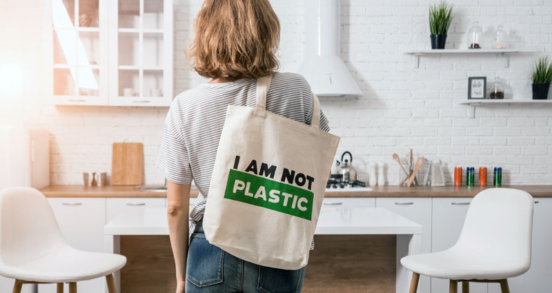girl with reusable tote bag