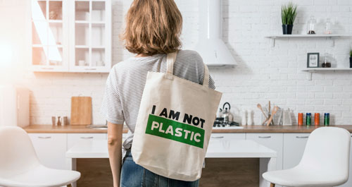 girl with reusable tote bag