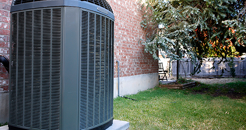 Photo of someone making repairs to their HVAC system