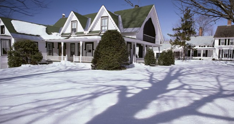 snow on homes and yard