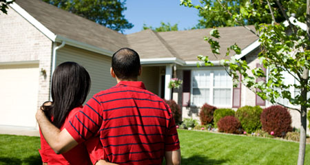 New homeowners admiring new home