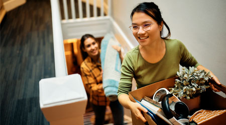 A woman visiting rental apartment with a real estate agent 