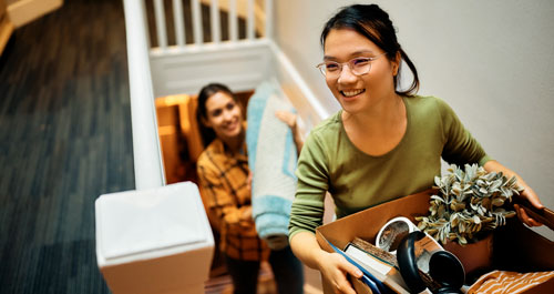 A woman visiting rental apartment with a real estate agent 