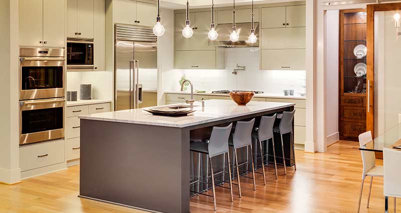 Beautiful kitchen with an island and hanging lights