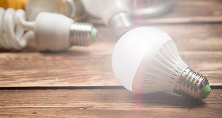 Light bulbs on a wooden table