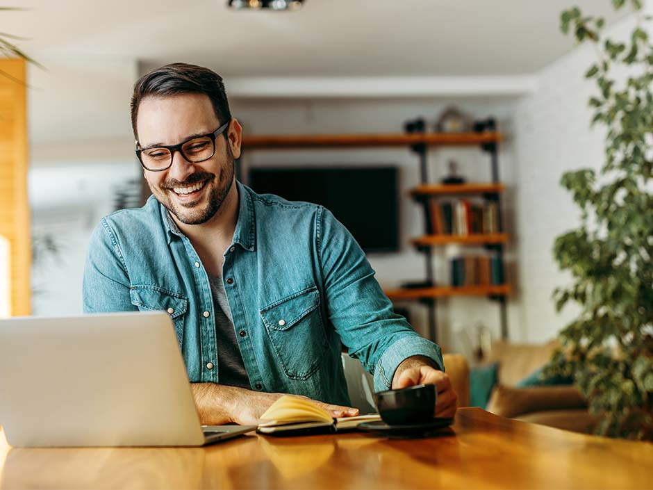 man-at-home-laptop-drinking-coffee-m