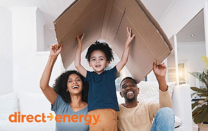 Family under cardboard box